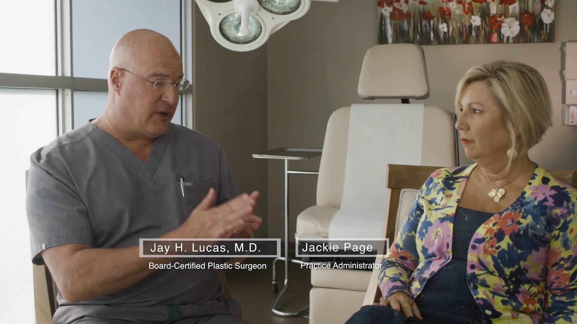 Dr. Lucas speaking to patient Jackie in doctor's office