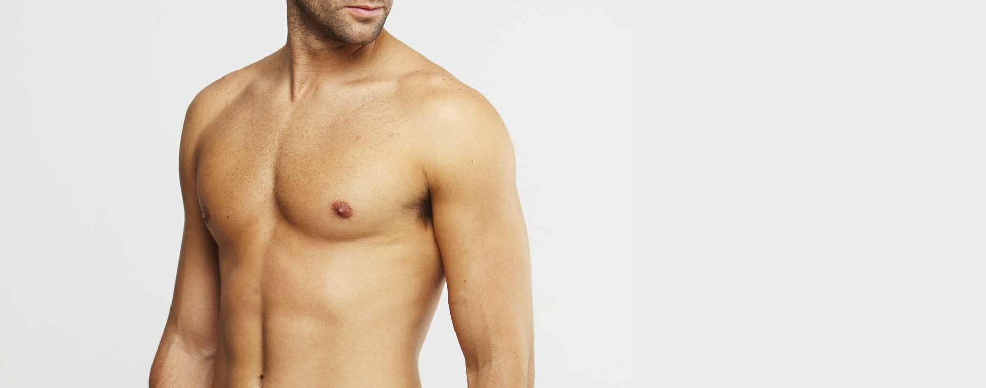 Chest and stomach of shirtless man